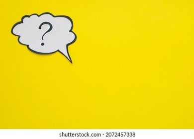 Question mark speech bubble isolated on yellow background.