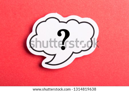 Question mark speech bubble isolated on red background.
