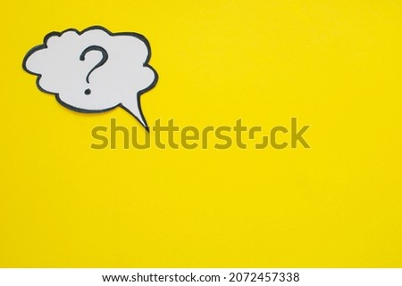 Question mark speech bubble isolated on yellow background.