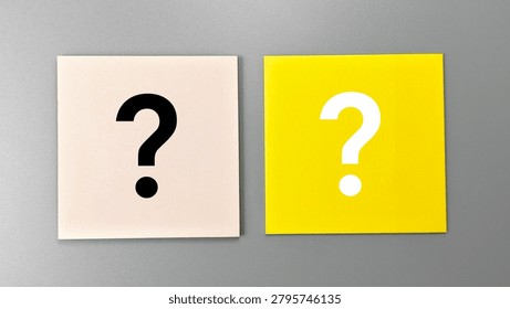 Question Mark Sticky Notes on Gray Background Representing Choices Decisions Brainstorming Surveys and Problem Solving. 