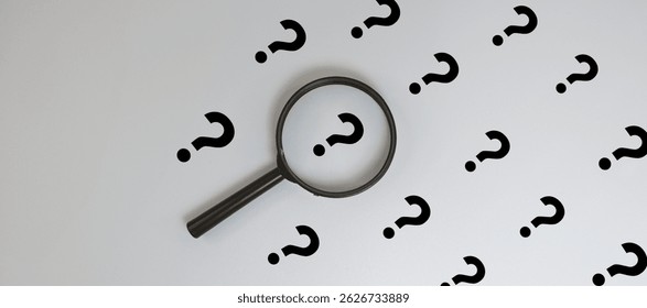 Question Mark Symbol Concept with Magnifying Glass on Question Mark Background – Idea, Curiosity, Search, Problem Solving, Knowledge, and Uncertainty Exploration. 