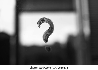 Question Mark Symbol On Misty Mirror With Water Droplets