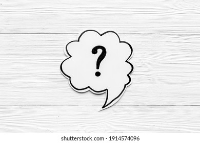Question mark symbol on speech bubble, top view