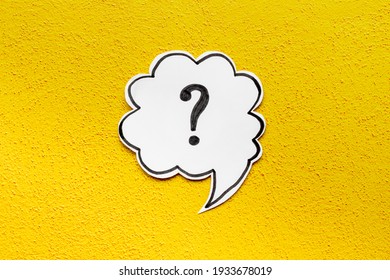 Question mark symbol on speech bubble, top view - Shutterstock ID 1933678019