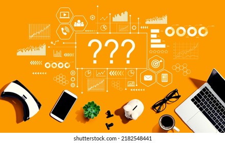 Question Marks With Electronic Gadgets And Office Supplies - Flat Lay