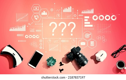 Question Marks With Electronic Gadgets And Office Supplies - Flat Lay