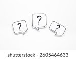Question marks on speech bubbles, top view. Ask and answer concept