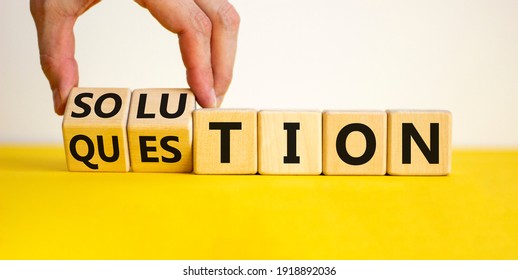 Question and solution symbol. Businessman turns wooden cubes and changes the word 'question' to 'solution'. Beautiful yellow table, white background, copy space. Business question and solution concept - Shutterstock ID 1918892036