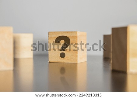 Questionmark ? on wooden cube