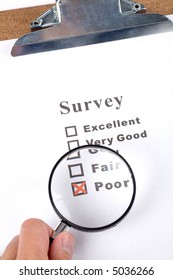 questionnaire and magnifier, business concept