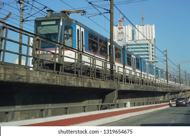 Quezon City, Metro Manila / Philippines - January 19 2019: A Manila Metro Rail Transit System Line 3 Train Travelling Along EDSA