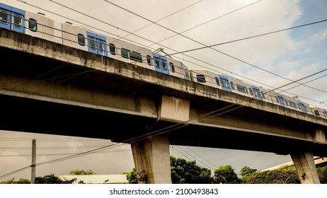 Quezon City, Metro Manila Philippines - September 10, 2020: Light Railway Transit LRT In The Philippines - Elevated Train Railway Street Photo	