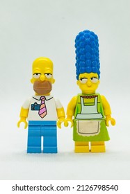 Quezon City, Philippines - February 20, 2022: Lego Simpsons Minifigure Homer and Marge Simpson Posing together as a couple (portrait)