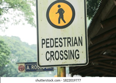 Quezon City, Philippines  - October 3, 2018: Pedestrian Crossing Sign In University Of The Philippines Diliman (UP Diliman)