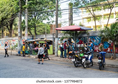 Quezon City/Philippines - April 5, 2019: A Food Cart Selling Congee For Breakfast And A Small Sari Sari Store Early In The Morning For Employees 