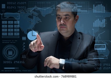 Quick access to data using modern technology. Businessman works with a virtual interface - 3D projection. Futuristic technologies.