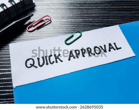 Quick approval writting on table background.