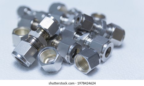 Quick connect fittings coupling for assembling compressed air, hydraulics, pneumatics, gases, fuel lines.Close up. Selective focus.