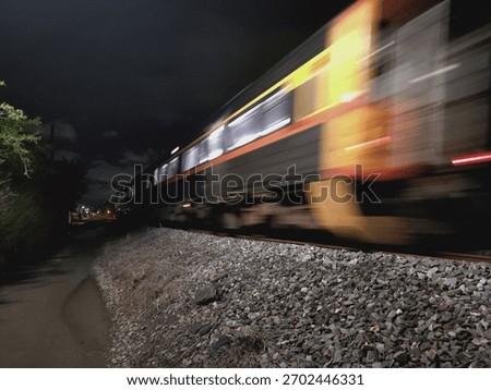 Quick moving train at night 