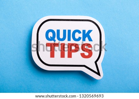Quick Tips Concept speech bubble isolated on blue background.