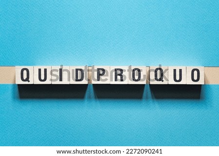 Quid pro quo - word concept on cubes, text