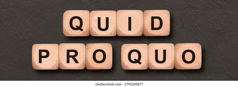 quid pro quo written on wooden cubes