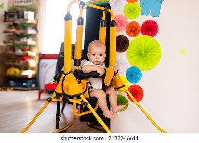 Quiet Cute Baby Boy In A Swing Home