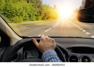 Quiet driving on sunny day goes toward success - Shutterstock ID 282002915