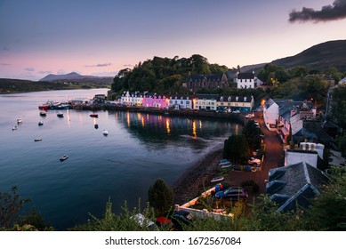 Quiet evening view of the colorful houses at Portree town of Scotland