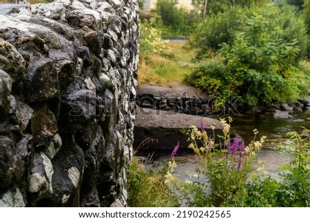 The Quiet Man Bridge is a dry stone bridge, which is best known for having been a favourite filming location for John Wayne.  Located between Galway and Clifden Ireland.