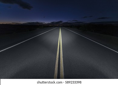 Quiet Mojave Desert Portion Of Route 66 At Night In Southern California.    