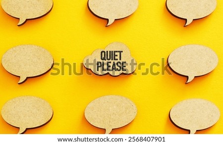 Quiet please message on speech bubble sign. Keep silence and stop talking loudly