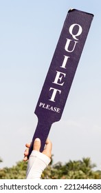 The Quiet Please Sign Was Held Up By Staff In Golf Tournament, Before Starting The Game. 