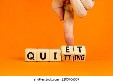 Quiet quitting symbol. Concept words Quiet quitting on wooden cubes. Businessman hand. Beautiful orange table orange background. Business quiet quitting concept. Copy space. - Shutterstock ID 2203706539