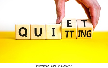 Quiet quitting symbol. Concept words Quiet quitting on wooden cubes. Businessman hand. Beautiful yellow table white background. Business quiet quitting concept. Copy space. - Shutterstock ID 2206602901