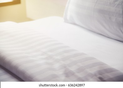Quilt Bed  White Pillows On White Bed In Bedroom