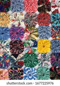 Quilt Button Style Yo Yo Flower Vintage Pattern In Colorful Fabric Arrangment