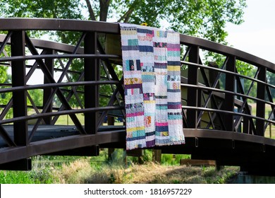 Quilt Hanging On A Bridge