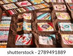 A quilt made using the patchwork technique.