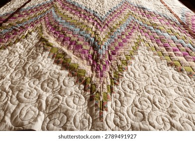 A quilt made using the patchwork technique.