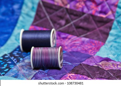 Quilt with quilting threads