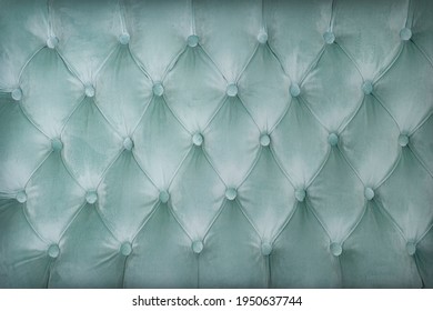 Quilted Velour Buttoned Green Blue Colour Fabric Wall Pattern Background. Elegant Vintage Luxury Sofa Upholstery. Interior Plush Backdrop