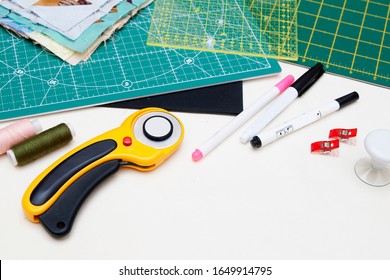 Quilting Tools - Rugs, Knife, Ruler, Felt-tip Pens On White Background