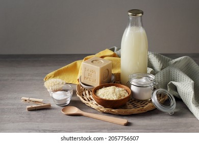 Quimper Brittany France - November 10 2021: Marseille Soap Bar, Pure Soap Flakes, Baking Soda And Home Made Washing Up Liquid In The Glass Bottle. DIY Making Home-made Laundry Detergent. Copy Space.