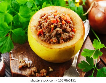 Quince Stuffed With Meat On The Table