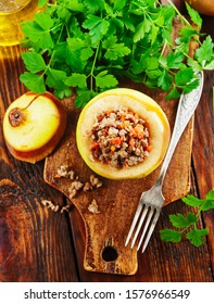 Quince Stuffed With Meat On The Table