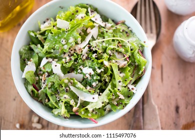 Quinoa & Baby Kale Salad With Sunflower Seeds, Shredded Coconut, Mixed Quinoa And Mint Yoghurt Dressing