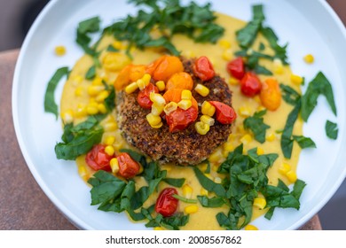 Quinoa Black Bean Cake With Corn Puree And Fresh Tomatoes And Corn Beautiful Vegan Meal