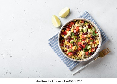 Quinoa, Corn, Bean And Avocado Salad. Healthy Food Concept, Top View, Place For Text
