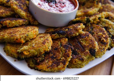 Quinou, Chickpea, Lentil Burger With Vegan Red Tomato Sauce Soup.